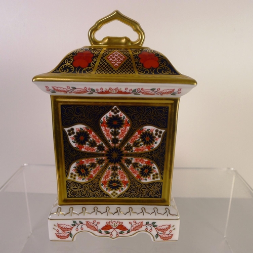 424 - A Royal Crown Derby old Imari 1128 mantel clock, 18cm tall, with box