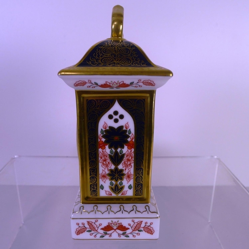 424 - A Royal Crown Derby old Imari 1128 mantel clock, 18cm tall, with box