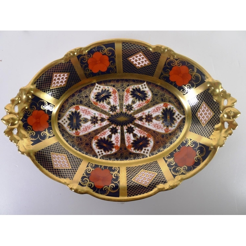 433 - A Royal Crown Derby old Imari 1128 footed basket, 29cm long, with box