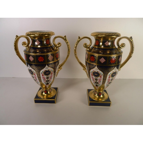 435 - A pair of Royal Crown Derby old Imari 1128 two handled Thorpe vases, 30cm tall, with boxes