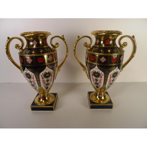 445 - A pair of Royal Crown Derby old Imari 1128 two handled Thorpe vases, 29cm tall, with boxes