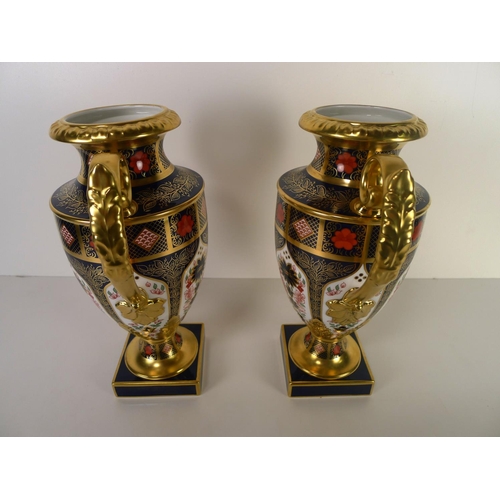 445 - A pair of Royal Crown Derby old Imari 1128 two handled Thorpe vases, 29cm tall, with boxes