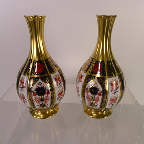 446 - A pair of Royal Crown Derby old Imari 1128 orchid vases, 17cm tall, with boxes