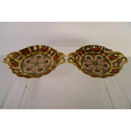 447 - A pair of Royal Crown Derby old Imari 1128 circular baskets, 16cm diameter