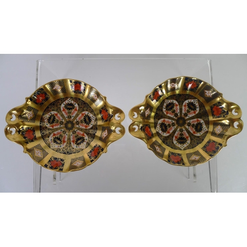 447 - A pair of Royal Crown Derby old Imari 1128 circular baskets, 16cm diameter