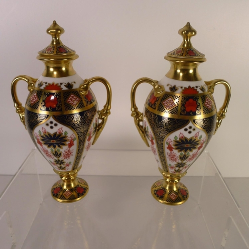 453 - A pair of Royal Crown Derby old Imari 1128 Tissington vases with lids, 20cm tall, one box only