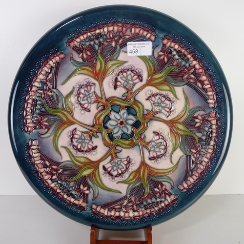 458 - A modern Moorcroft pottery cabinet plate, 35cm diameter, decorated with flower & foliage, impressed ... 