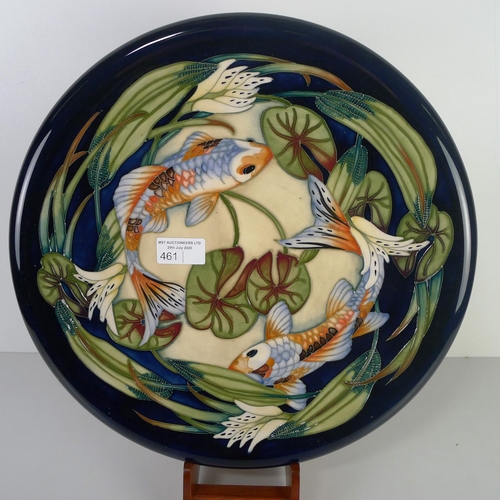 461 - A modern Moorcroft pottery cabinet plate, 35cm diameter, decorated with fish & foliage, impressed & ... 