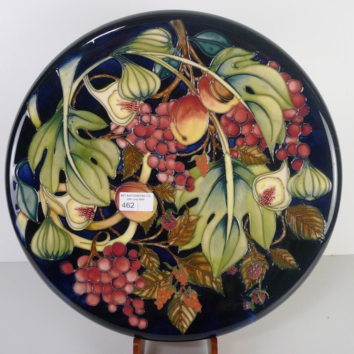 462 - A modern Moorcroft pottery cabinet plate, 35cm diameter, decorated with fruit & foliage, impressed &... 