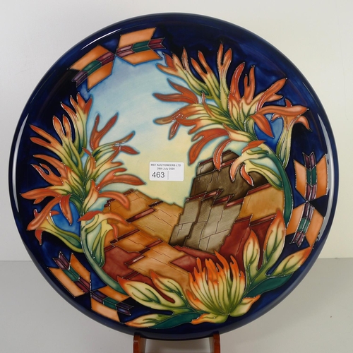 463 - A modern Moorcroft pottery cabinet plate, 35cm diameter, decorated with stonework & foliage, impress... 