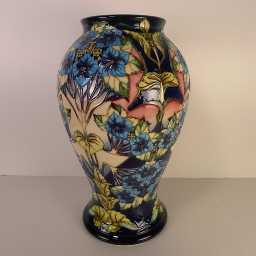 464 - A modern Moorcroft pottery vase, 43cm tall, decorated with flower & foliage, impressed & painted mar... 