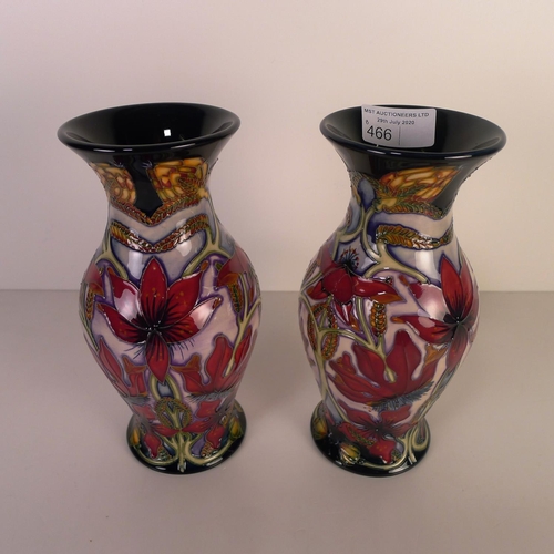 466 - A pair of modern Moorcroft pottery vases, 19cm tall, decorated with flowers & foliage, impressed & p... 