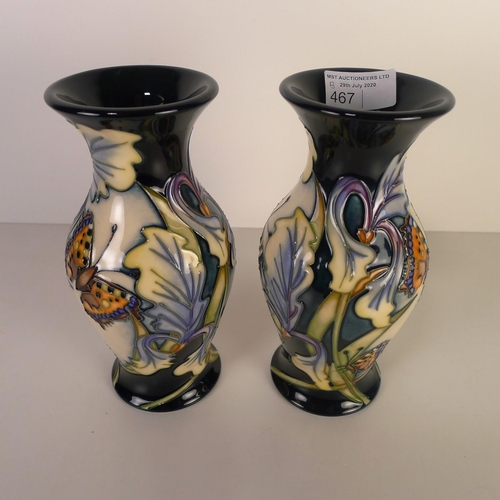 467 - A pair of modern Moorcroft pottery vases, 20cm tall, decorated with butterflies & foliage, painted m... 