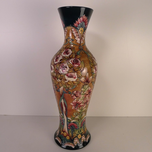 469 - A modern Moorcroft pottery vase, 53cm tall, decorated with flowers & foliage, impressed & painted ma... 