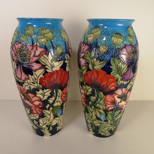 482 - A pair of modern Moorcroft pottery vases, 37cm tall, decorated with flowers & foliage, impressed & p... 