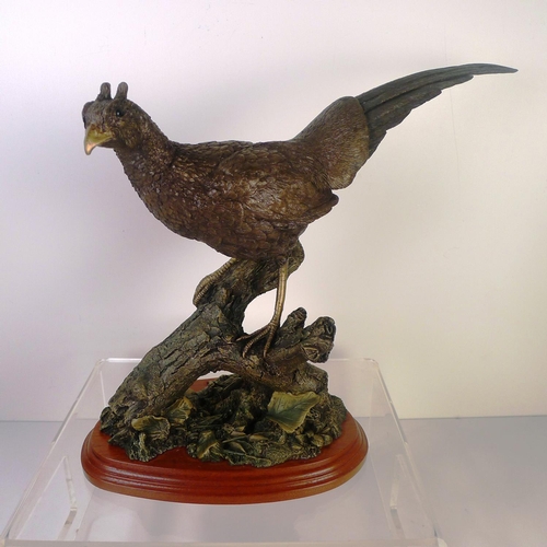 74 - A bronze coloured resin pheasant, 28cm tall