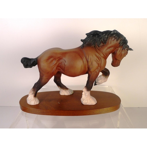 82 - A ceramic cart horse, 21cm tall, 