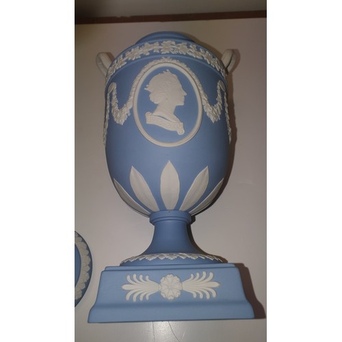 278 - 2 similar Wedgwood blue and white jasperware urn shape vases each with two handles and a lid 32cm ta... 