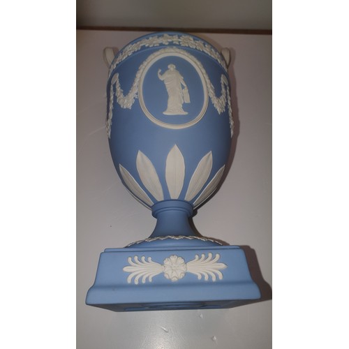 278 - 2 similar Wedgwood blue and white jasperware urn shape vases each with two handles and a lid 32cm ta... 