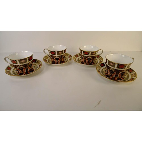 341 - A set of 4 Royal Crown Derby old Imari 1128 breakfast cups and saucers. With boxes