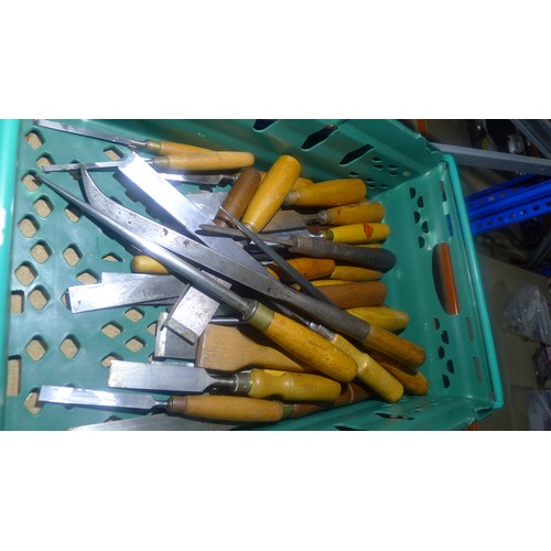 149 - A quantity of approximately 30 wood turning & other chisels by Marples etc - plastic crate is not in... 