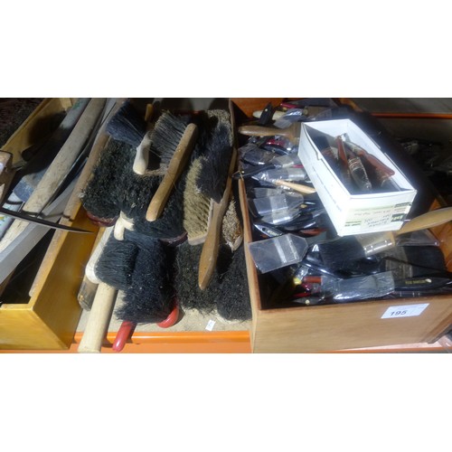 195 - A quantity of various items including paint brushes, other brushes, 2 cast iron weights, belts, 3 sm... 