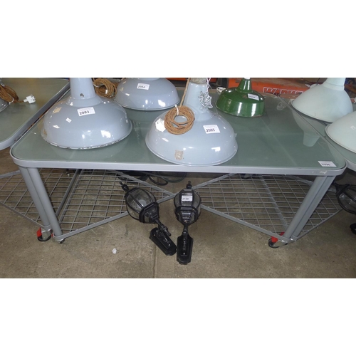 2096 - 1 grey metal wheeled table with opaque glass top and partial metal mesh shelf below, approx 140cm x ... 