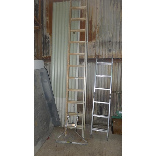 2123 - 1 aluminium double extending 13 tread ladder (please note the ladder is damaged on front between the... 