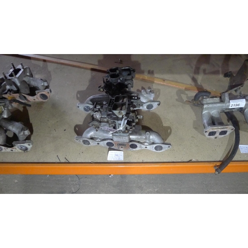 2195 - 2 manifolds both believed to fit Ford Kent engines, both of which have a twin choke Webber carburett... 