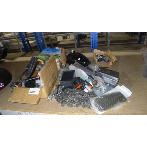 2289 - A quantity of various items including parts for a BT powered bike comprising a small fuel tank, spro... 