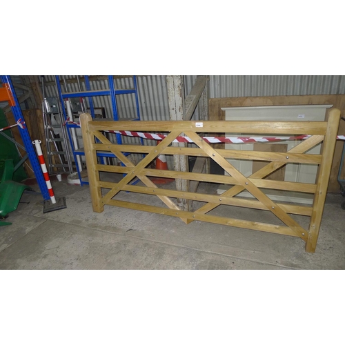 2344 - 1 wooden five bar gate width approx 2.4m  - has light damage on top bar just to left of lot number