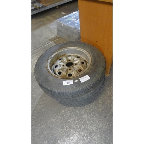 2220 - 2  Ford Escort steel wheel rims type 5 1/2 J x 13 both with a 185/70 R13 tyre fitted