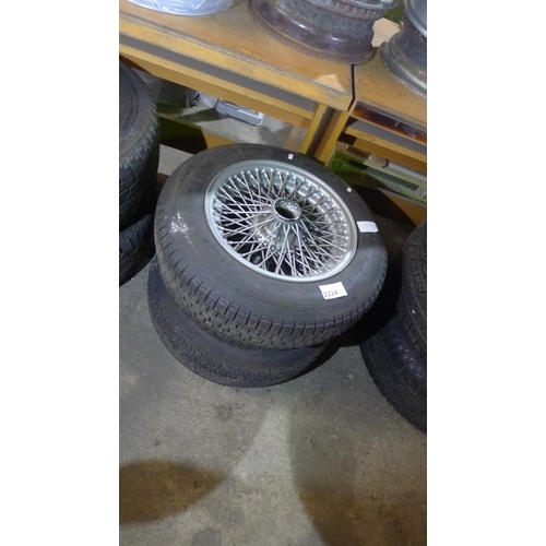 2224 - 3 spline fitting wire wheels type 5J x 15 inch, each has a 15inch tyre fitted