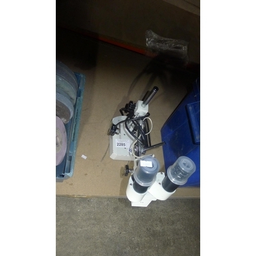 2285 - A binocular inspection microscope on a long arm stand, 240v - no make visible. Top two eyepiece lens... 