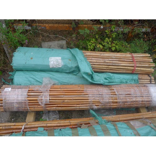 2374 - 4 rolls of bamboo garden screening, each roll approx 1.8m high, exact length unknown