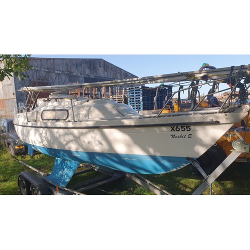 2395 - A Pandora 700 23ft bilge keel GRP Bermudan sloop, 4 berths with 7.5hp o/b engine and a twin axle roa... 