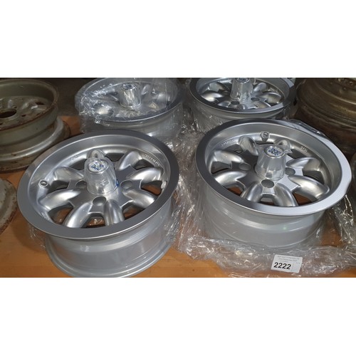 2222 - 4 unused MINILITE 13 x 6 inch alloy wheels with centre caps - to suit Ford