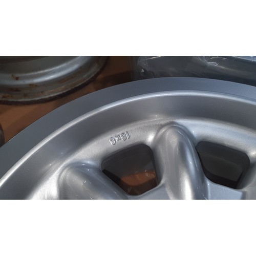 2222 - 4 unused MINILITE 13 x 6 inch alloy wheels with centre caps - to suit Ford