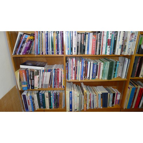 775d - Four bays of library books, mainly reference