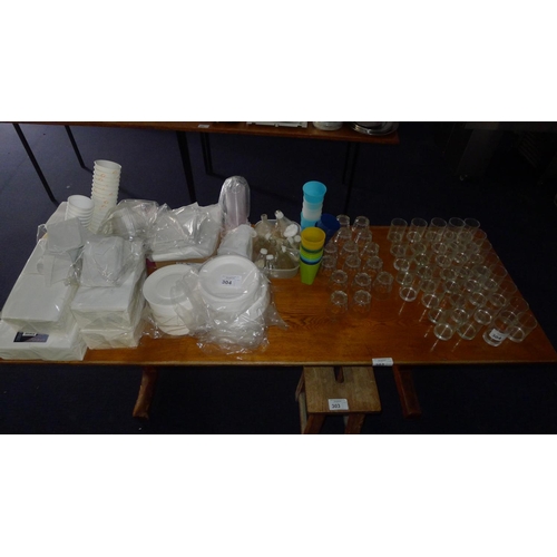 304 - A quantity of various items including glasses, disposable plates / napkins, salt & pepper pots etc