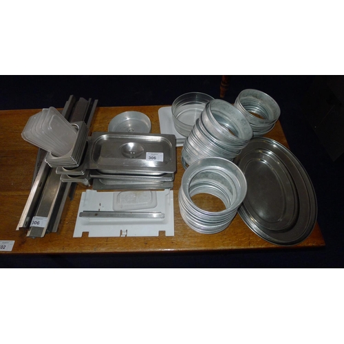 306 - A quantity of various items including metal plate stacking rings, metal oval trays, metal gastronorm... 