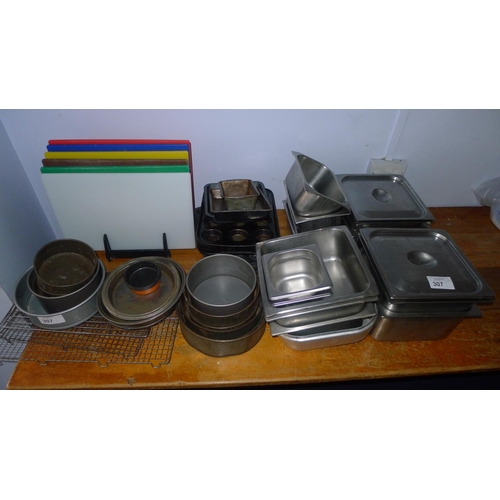 307 - A quantity of various items including chopping boards, cake tins, metal gastronorm pans etc