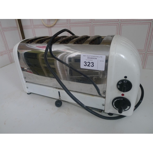 323 - 1 Dualit six slice toaster, 240v