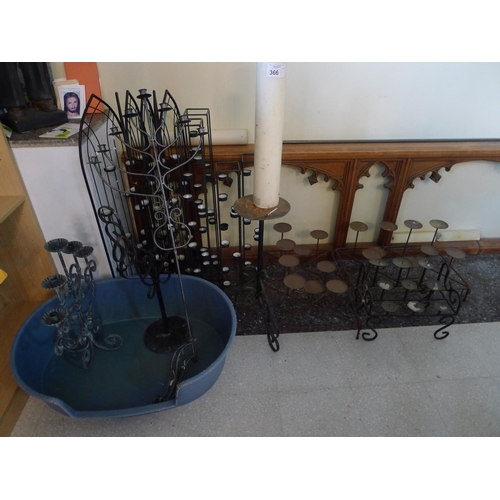 366 - A quantity of miscellaneous ecclesiastical metal candle stands and candles etc