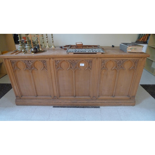 370 - A light oak ecclesiastical altar unit approximately 230cm wide