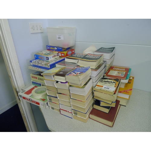 436 - A quantity of various German dictionaries / phrase books, jigsaws and several board games