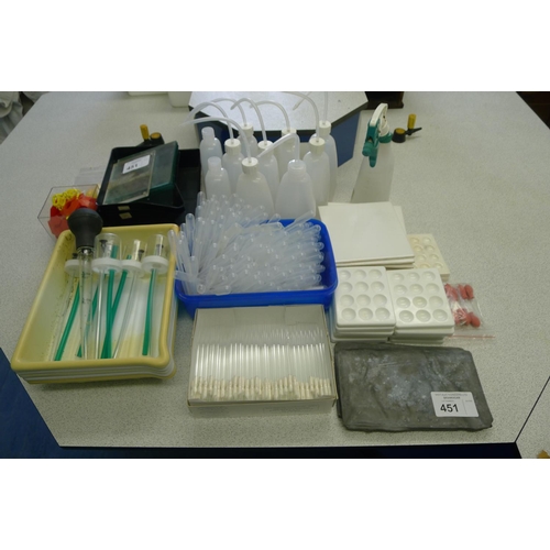 451 - A quantity of various laboratory related items including pipettes etc