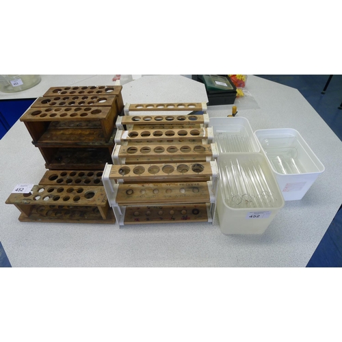 452 - A quantity of various laboratory glass test tubes & various wooden test tube racks