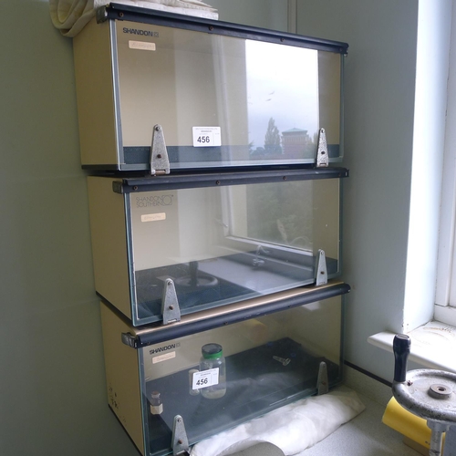 456 - 3 Shandon laboratory cabinets with bottom hinged glass fronts each approx 58cm w x 25cm d x 30cm hig... 