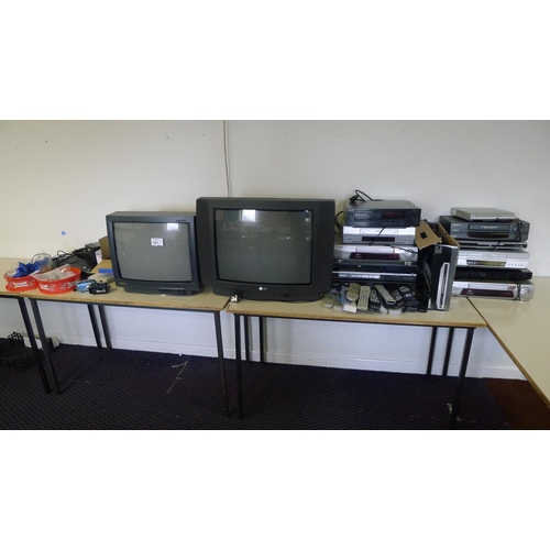 557 - A quantity of various items including 2 x CRT TVs, VHS video recorders, a Technics CD player, 2 Pana... 